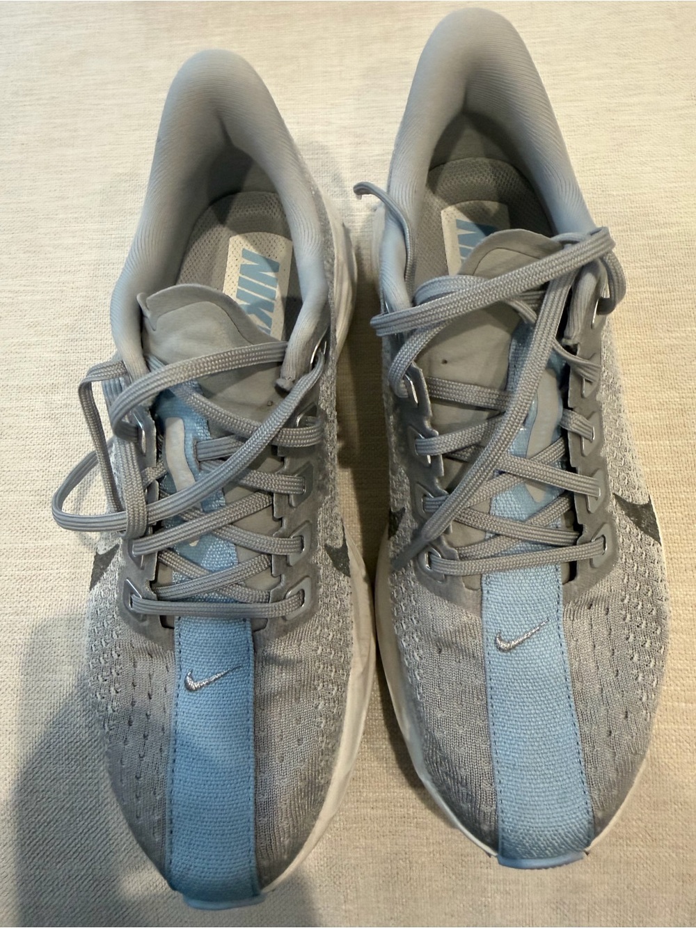 Nike women’s Grey and Light Blue Training Sneakers